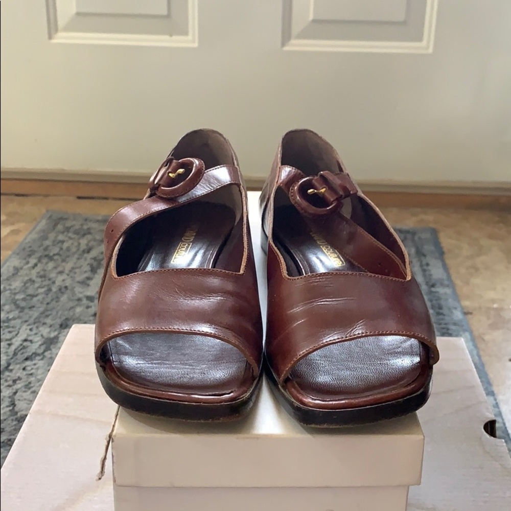 Open toe flat shoes with ankle strap. Leather